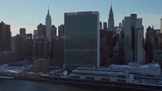 AX66_0221E - 4.8K aerial stock footage of United Nations Building, Midtown Manhattan skyscrapers, New York City
