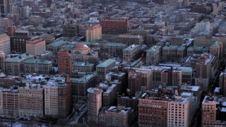 AX66_0280 - 4.8K aerial stock footage of an orbit of Columbia University in winter, New York City, twilight