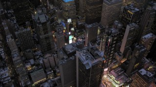 AX66_0348 - 4.8K aerial stock footage orbit Times Square in winter, New York City, twilight