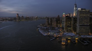 AX66_0374 - 4.8K stock footage aerial video of Lower Manhattan and Jersey City in winter, New York City, twilight