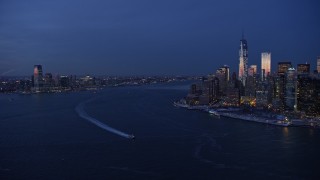 AX66_0375 - 4.8K stock footage aerial video of Downtown Jersey City and Lower Manhattan in winter, New York City, twilight