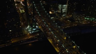 AX66_0422 - 4.8K stock footage aerial video of Queensboro Bridge and Midtown Manhattan skyscrapers, New York City, night