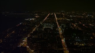 AX67_0005 - 4.8K aerial stock footage view of orbiting campus at Columbia University at night, New York City, New York