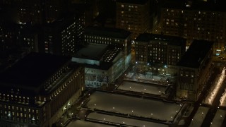 AX67_0013 - 4.8K aerial stock footage view of fly over Columbia University to approach and orbit Lerner Hall at night, New York City, New York