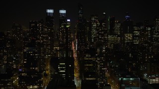 AX67_0056 - 4.8K aerial stock footage view of flying by Hell's Kitchen and Upper West Side at night, New York
