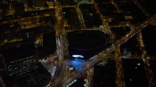 AX67_0102 - 4.8K aerial stock footage view of approaching Barclays Center at night, Brooklyn, New York