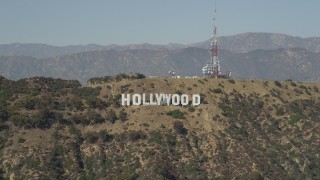 AX68_003 - 4.8K aerial stock footage of the Hollywood Sign and radio tower in Los Angeles, California