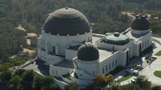 AX68_007 - 4.8K aerial stock footage flyby the east side of Griffith Observatory in Los Angeles, California