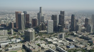 AX68_012 - 4.8K aerial stock footage tilt from Belmont High School to reveal Downtown Los Angeles, California