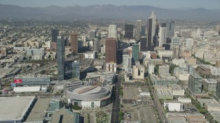 AX68_019 - 4.8K aerial stock footage pan from Staples Center and Ritz-Carlton to reveal Downtown Los Angeles skyscrapers, California
