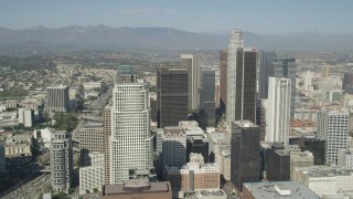 AX68_022 - 4.8K aerial stock footage approach City National Plaza, US Bank Tower, and Aon Center skyscrapers in Downtown Los Angeles, California