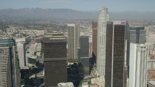 AX68_023 - 4.8K aerial stock footage fly between City National Plaza and Aon Center to approach US Bank Tower in Downtown Los Angeles, California