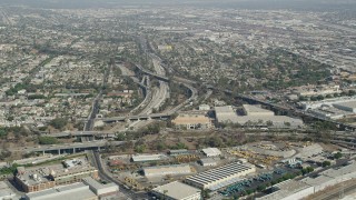 AX68_027 - 4.8K stock footage aerial video approach East Los Angeles Interchange in Boyle Heights, Los Angeles, California