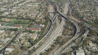 AX68_028 - 4.8K stock footage aerial video of heavy traffic on the East Los Angeles Interchange in Boyle Heights, Los Angeles, California