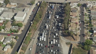 AX68_031 - 4.8K aerial stock footage bird's eye view of heavy traffic on Interstate 5 in Boyle Heights, Los Angeles, California