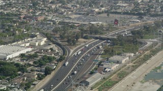 AX68_039 - 4.8K aerial stock footage approach traffic backing up on Interstate 710 in Bell Gardens, Los Angeles, California