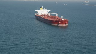 AX68_080 - 4.8K aerial stock footage approach an oil tanker anchored in San Pedro Bay in Long Beach, California