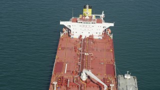 AX68_081 - 4.8K aerial stock footage fly over the deck of an oil tanker anchored in San Pedro Bay, Long Beach, California