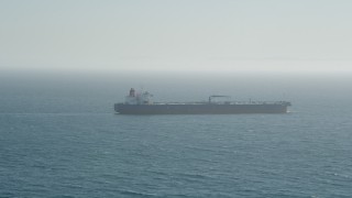 AX68_085 - 4.8K aerial stock footage of an oil tanker on the Pacific Ocean