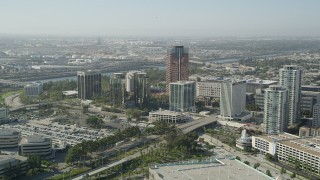 AX68_137 - 4.8K aerial stock footage approach a modern office building in Downtown Long Beach, California