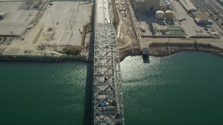 AX68_141 - 4.8K aerial stock footage fly over Gerald Desmond Bridge at the Port of Long Beach, California