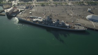 AX68_159 - 4.8K aerial stock footage of USS Iowa Battleship docked at the Port of Los Angeles, California