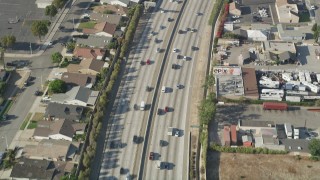 AX68_179 - 4.8K aerial stock footage of a bird's eye view of light traffic on a bend in I-110 in Carson, California