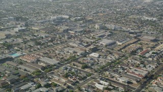 AX68_186 - 4.8K stock footage aerial video fly over apartment buildings and suburban homes in Gardena, California