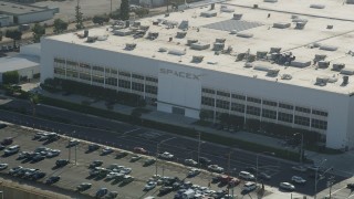AX68_192 - 4.8K aerial stock footage front of SpaceX office building in Hawthorne, California