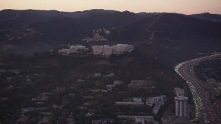 AX69_053 - 4.8K aerial stock footage of J. Paul Getty Museum at twilight, Brentwood, California