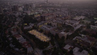AX69_060 - 4.8K aerial stock footage of the College college campus at twilight, Westwood, California