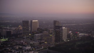 AX69_067 - 4.8K aerial stock footage of Century City skyscrapers at twilight in California