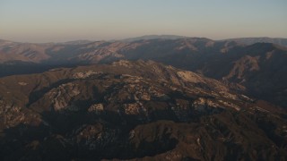 AX70_011 - 4K aerial stock footage Approach mountains at sunrise in Los Padres National Forest, California