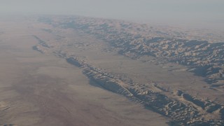 AX70_036 - 4K aerial stock footage Wide view of the San Andreas Fault, the Temblor Range, and desert plains in Southern California