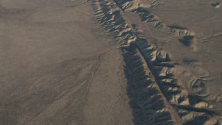 AX70_045 - 4K aerial stock footage Bird's eye of the San Andreas Fault in Southern California