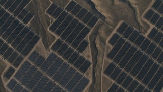 AX70_057 - 4K stock footage aerial video of A bird's eye of solar panels at the Topaz Solar Farm in the Carrizo Plain, California