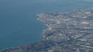AX70_087 - 4K aerial stock footage Flying by the coastal city of Santa Cruz, California