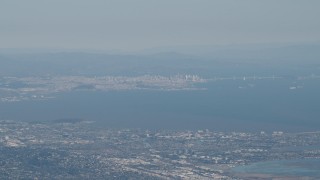 AX70_093 - 4K aerial stock footage San Francisco, the Bay Bridge, and San Francisco Bay seen from San Mateo, California