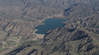 AX70_187 - 4K stock footage aerial video The Santa Felicia Dam and Lake Piru in the Los Padres National Forest, California