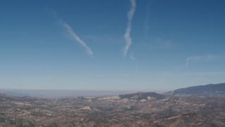 AX70_199 - 4K aerial stock footage Blue skies and sparse clouds above Los Padres National Forest, California