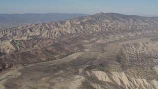 AX70_205 - 4K aerial stock footage View of a rugged desert mountains in the Caliente Mountain Range, California