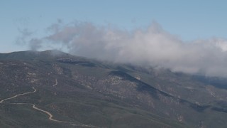 AX70_253 - 4K aerial stock footage Low clouds over the Santa Lucia Range, California