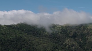 AX70_275 - 4K aerial stock footage of cloud-covered mountains in the Santa Lucia Range in California