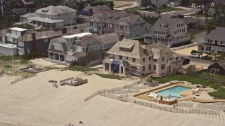 AX71_083 - 5.1K aerial stock footage of beachfront homes in Bay Head, Jersey Shore, New Jersey