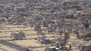 AX71_094 - 5.1K aerial stock footage of homes near the beach in Seaside Heights, Jersey Shore, New Jersey