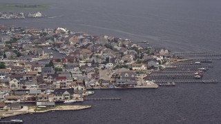 AX71_105 - 5.1K aerial stock footage of waterfront homes and docks in Toms River, New Jersey