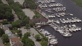 AX71_106 - 5.1K aerial stock footage of Dillon's Creek Marina in Island Heights, New Jersey