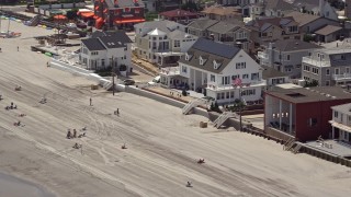 AX71_207 - 5.1K aerial stock footage of decorated beachfront home in Ventnor City, New Jersey