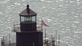 AX72_030 - 5.1K aerial stock footage orbiting the top of the Delaware Breakwater East End Light