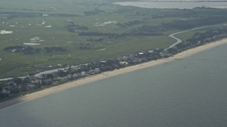 AX72_036 - 5.1K aerial stock footage of beachfront houses in Broadkill Beach, Delaware
